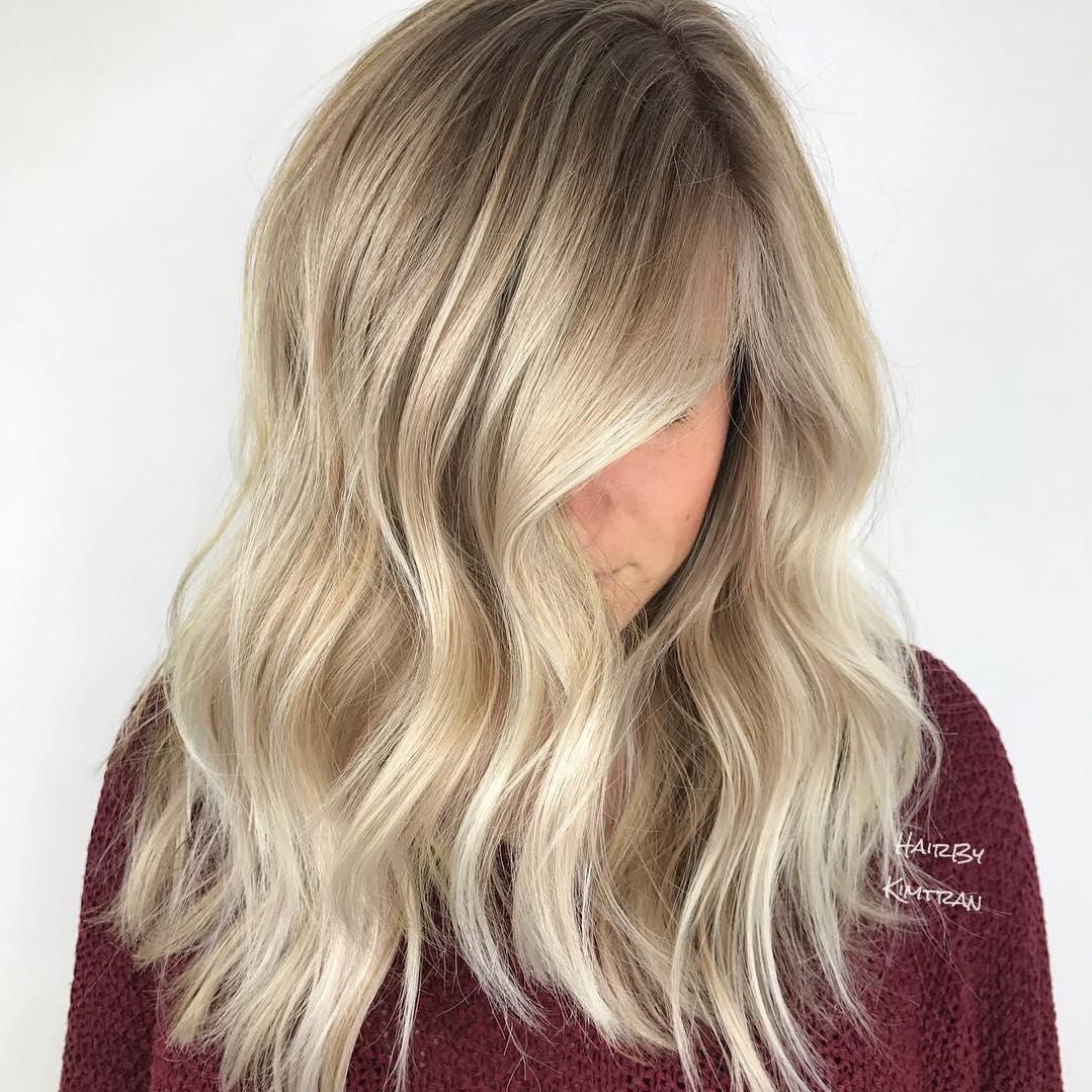 7 Warm-Toned Blonde Hair Colors from Honey to Bronde