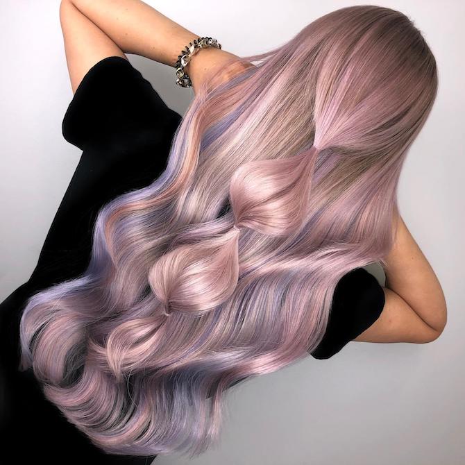 Back of woman’s head with waist-length, pastelcolored hair, created using Wella Profession-als.