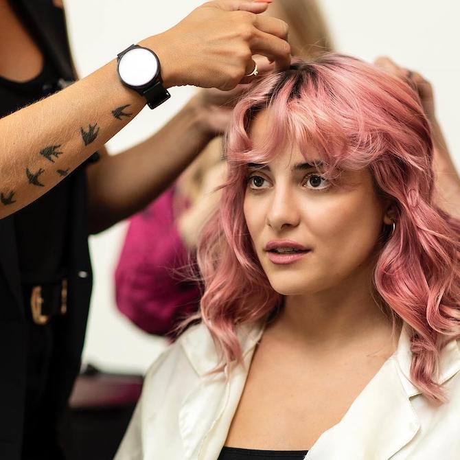 Model in a salon, having a hair colour consultation.