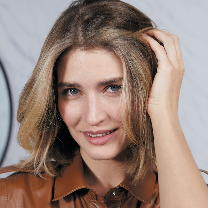 Model with shoulder-length, brown-blonde hair.