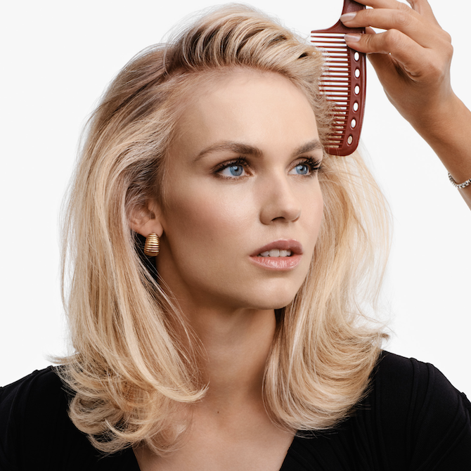 Model with mid-length, blonde, glossy hair.