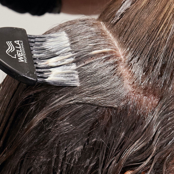 Wella Color Touch is applied to the roots of hair.