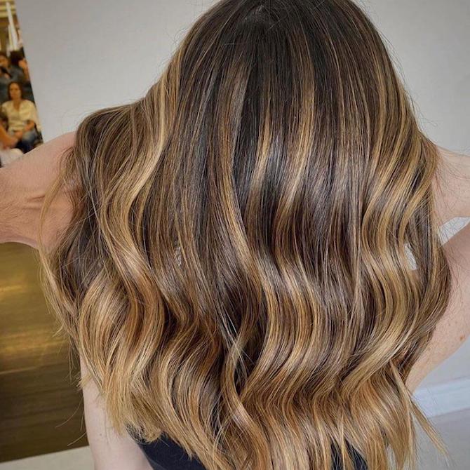 wavy brown hair with blonde highlights