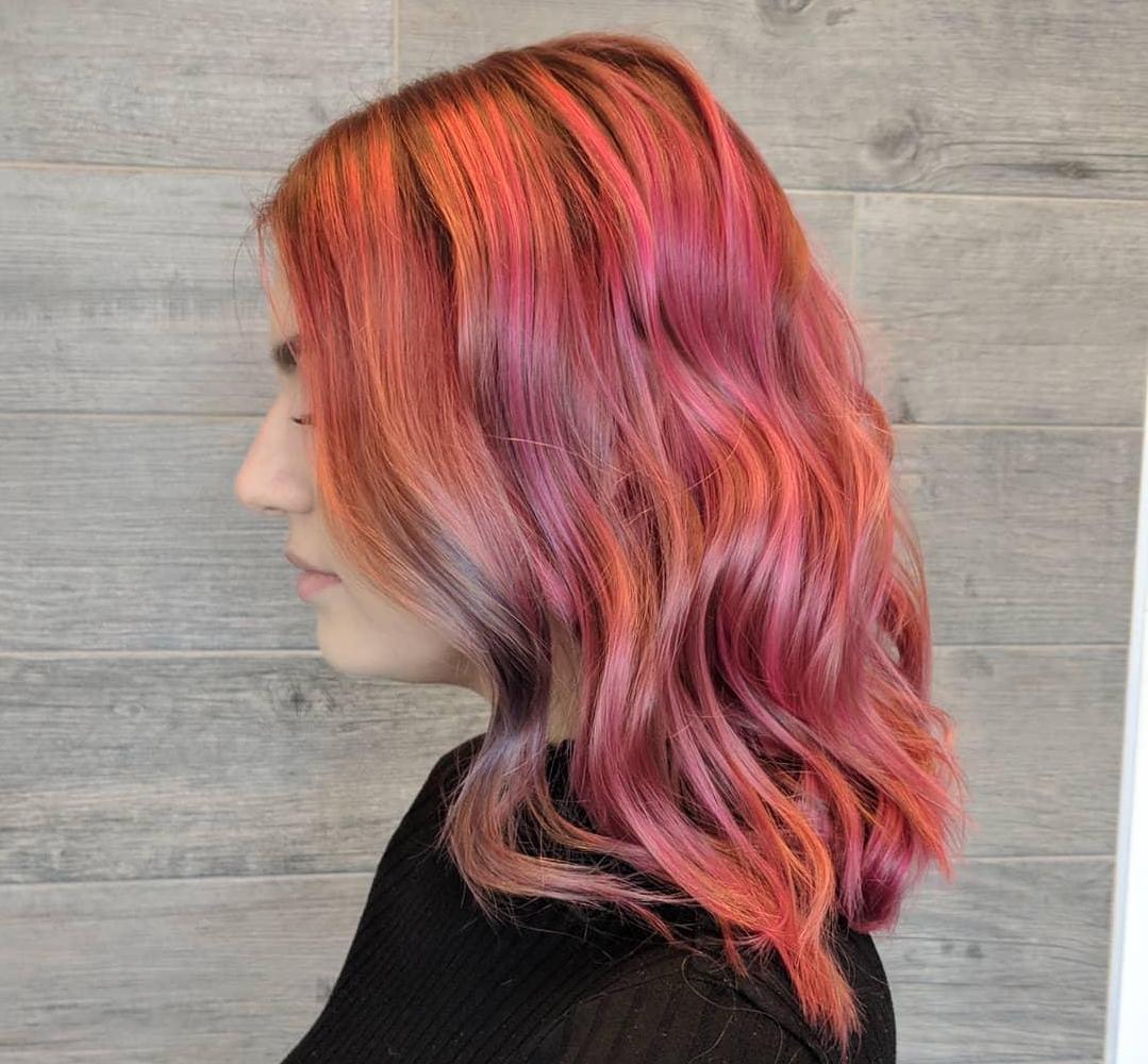 Image of woman with rainbow hair created using Wella Professionals products