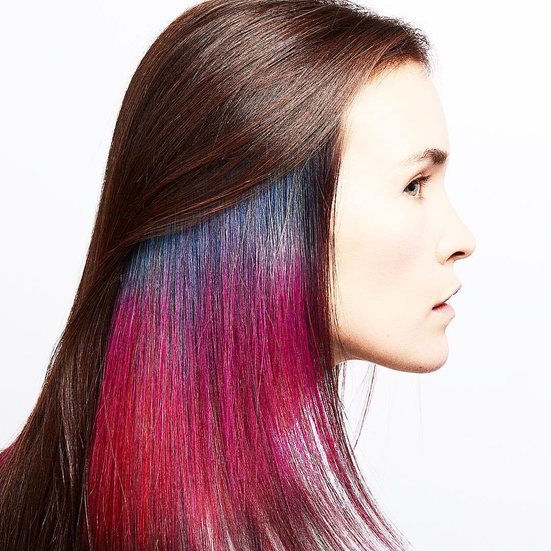 Image of woman with rainbow hair created using Wella Professionals products