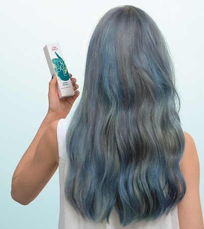 Image of woman with blue hair holding a Color Fresh Create box
