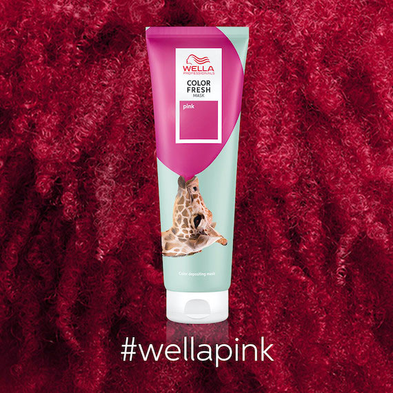 Close-up of hot pink, curly hair with the Color Fresh Mask in Pink.