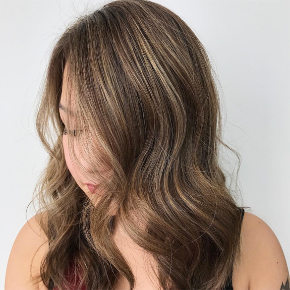 REVERSE BALAYAGE IS THE NEW GO-TO TREND FOR SUN-KISSED HAIR