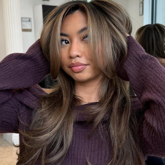 Cool-toned caramel brown hair in a sophisticated, ashy brunette shade.