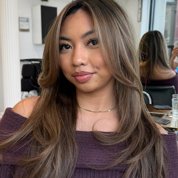 Cool-toned caramel brown hair in a sophisticated, ashy brunette shade.