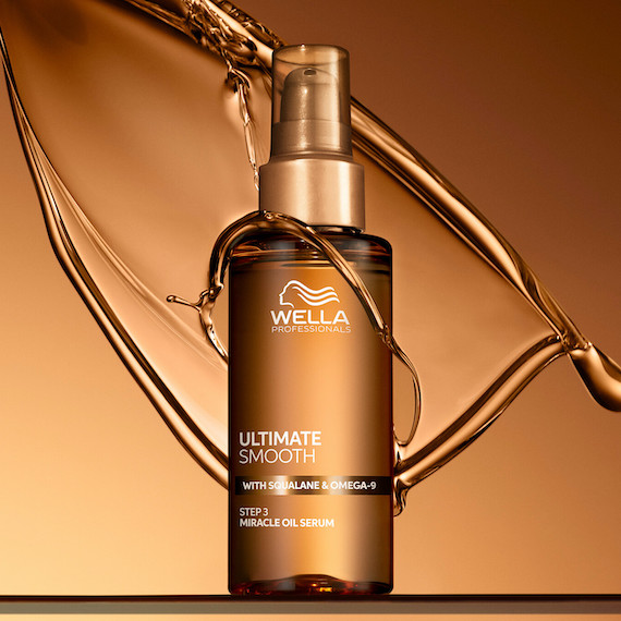 ULTIMATE SMOOTH Miracle Oil Serum against a gold background.