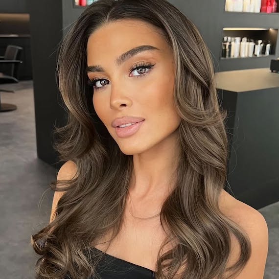 Ashy chocolate brown hair colour with cool undertones and soft balayage highlights.