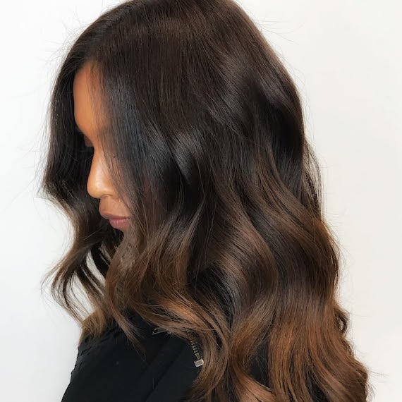Grown-out balayage refreshed with a chocolate brown colour-depositing hair mask.
