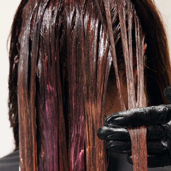 Color Touch Melt shades are applied to a model’s hair and left to develop.