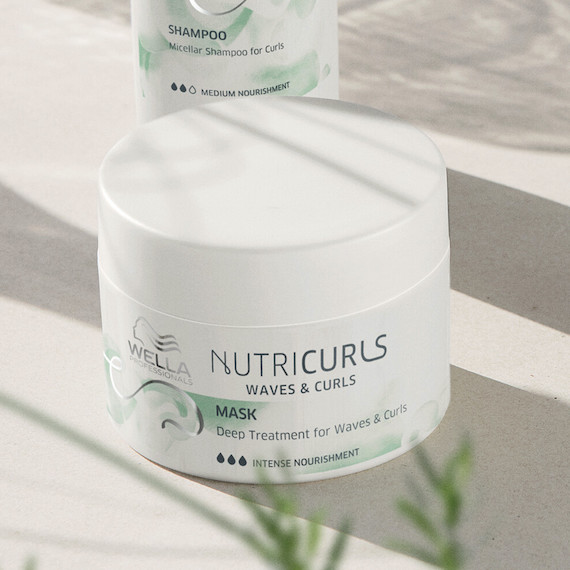 NutriCurls Deep Treatment on a white surface.
