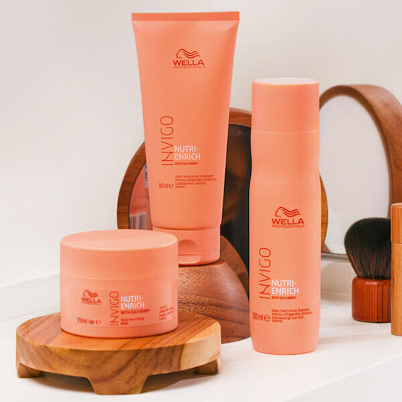 INVIGO Nutri-Enrich Mask, Conditioner and Shampoo in a bathroom.