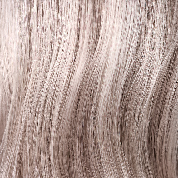 Close-up of model’s cool blonde hair.