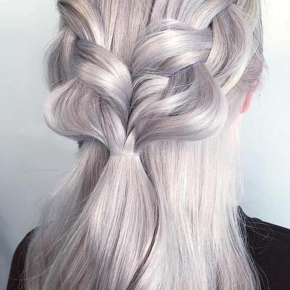 Back of woman’s head with silver, braided hair, created using Wella Professionals.