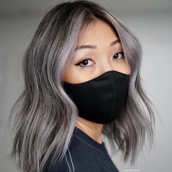 Image of woman with grey hairstyle created using Wella Professionals products