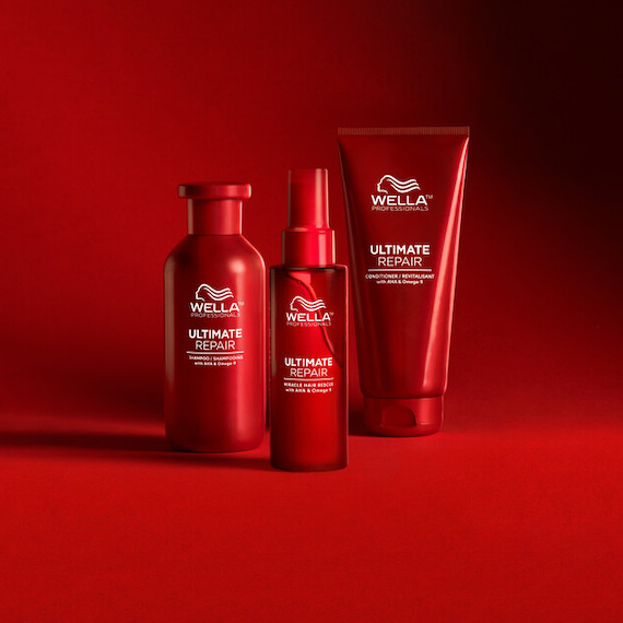 Ultimate Repair Shampoo, Ultimate Repair Conditioner and Miracle Hair Rescue appear in front of a red backdrop.