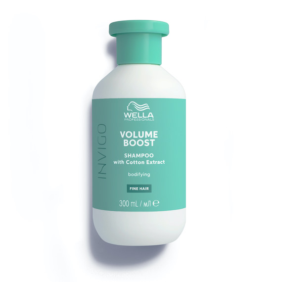 A bottle of INVIGO Volume Boost Bodifying Shampoo.