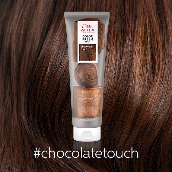 Close-up of brunette hair with a bottle of Color Fresh Mask in Chocolate Touch in the foreground.