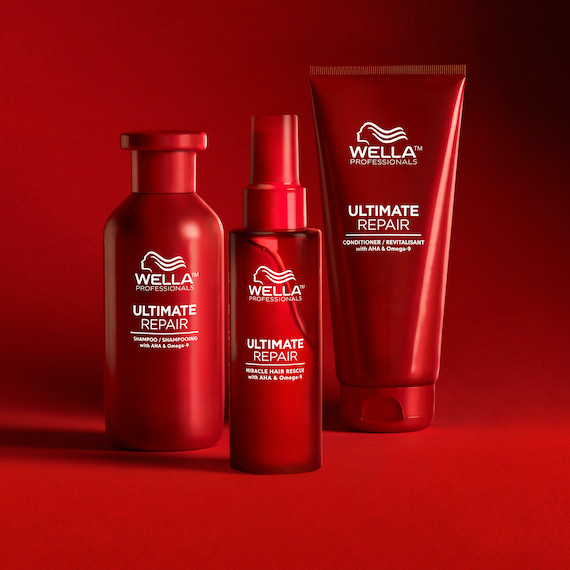 ULTIMATE REPAIR Shampoo, Conditioner and Miracle Hair Rescue appear side by side against a red backdrop. 
