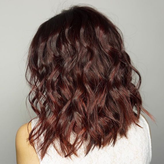 dark red brown curly hair