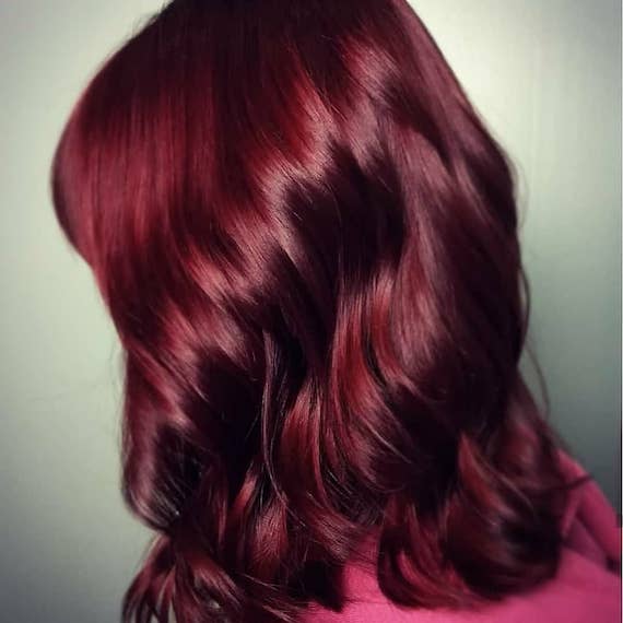 Photo of woman’s hair with red hair color. Look created by Wella Professionals.