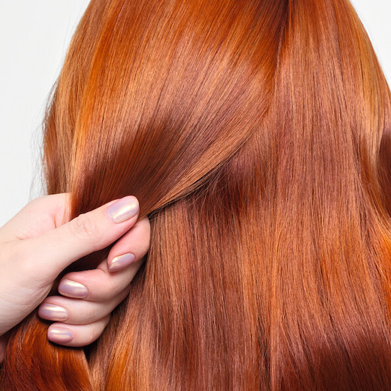 Close-up of model’s pumpkin spice hair.