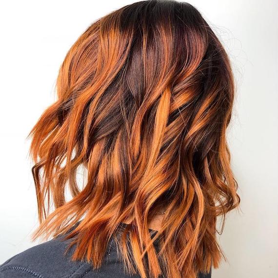 Balayage on copper red hair, created using Wella Professionals