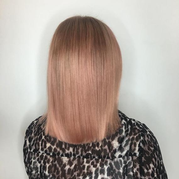 Image of woman with blunt haircut created using Wella Professionals products