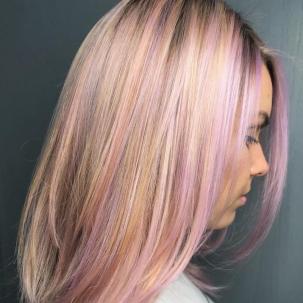 Image of woman with pink hair created using Wella Professionals products