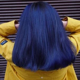 Back of model’s head with mid-length, straight, navy blue hair.