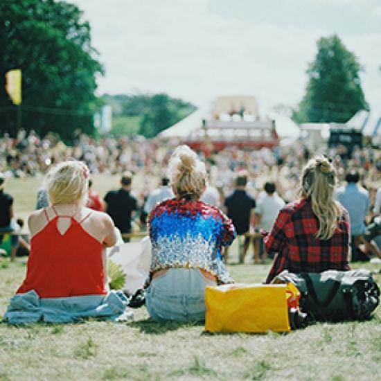 Three women at a festival