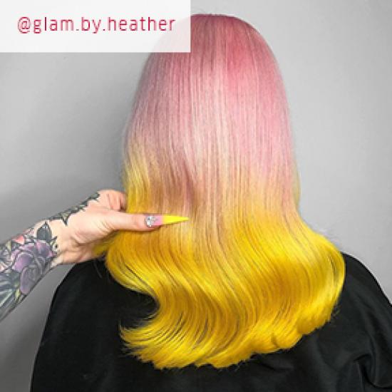 Model with pink and yellow ombre hair, created using Wella Professionals