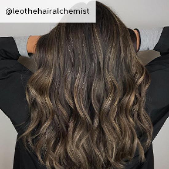 Ash brown balayage hair, created using Wella Professionals