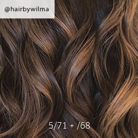 Close-up of dark brown balayage hair, created using Wella Professionals.