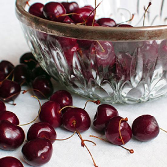 Image of cherries in glass bowl