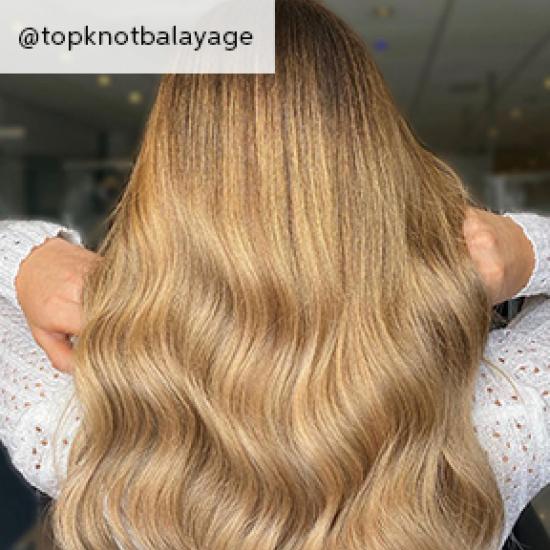 Image of back of head showing butterscotch blonde hair 