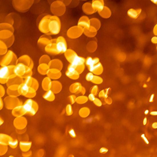 Close-up of honey coloured texture.