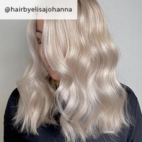Side of wavy mother of pearl hair, created using Wella Professionals
