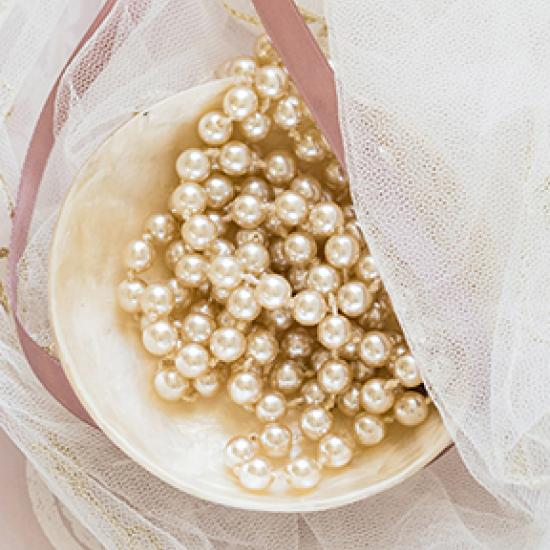 cream pearls in a bowl