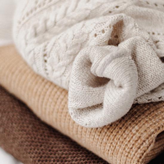 Image of knitted cream jumper