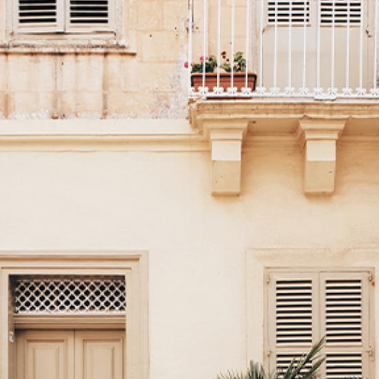 Sandy coloured building.