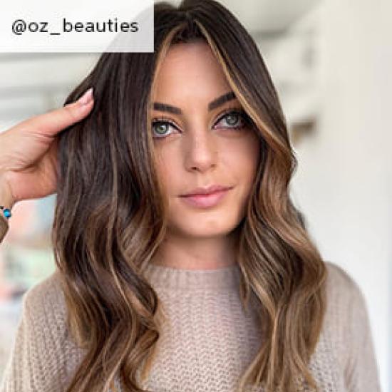 Model using Signature Naturals Collection product facing the camera by @oz_beauties
