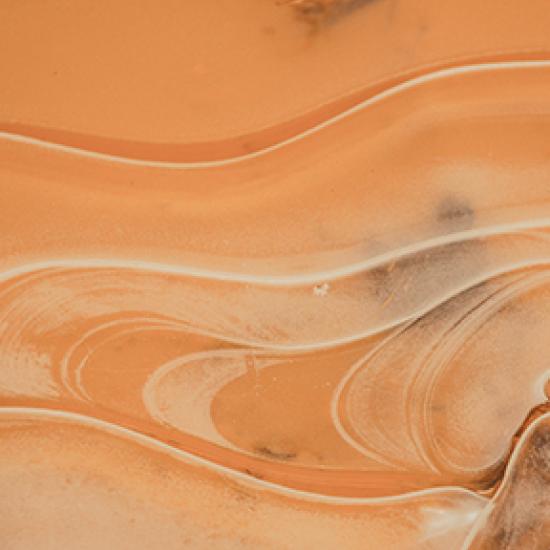 Toffee colored swirls in water