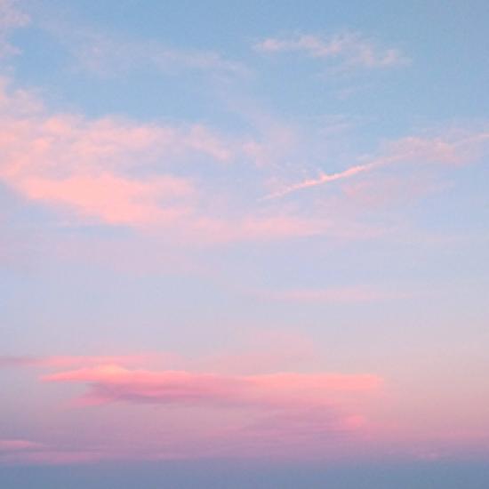 Pink clouds in a blue sky