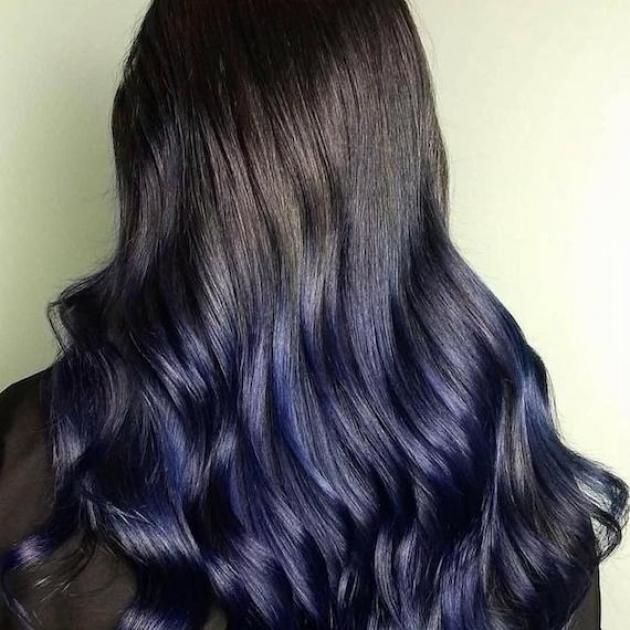 Long, wavy, blue black hair, created using Wella Professionals