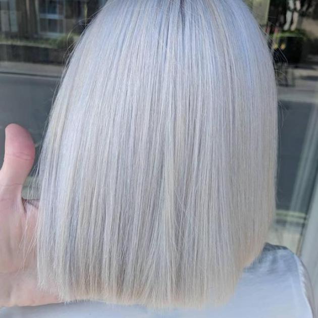 Woman with blonde and pastel blue bob
